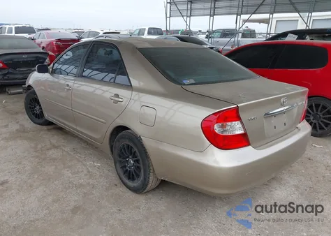 2002 Toyota Camry Le from USA, damaged, VIN JTDBE32K220068393